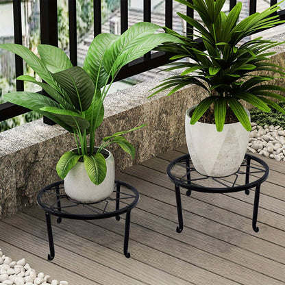 Sturdy black wrought iron stand, suitable for indoor and outdoor use.