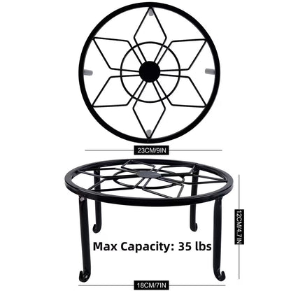 Sturdy black wrought iron stand, suitable for indoor and outdoor use.