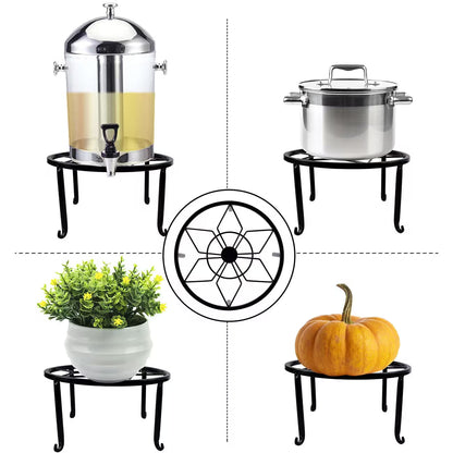 Sturdy black wrought iron stand, suitable for indoor and outdoor use.